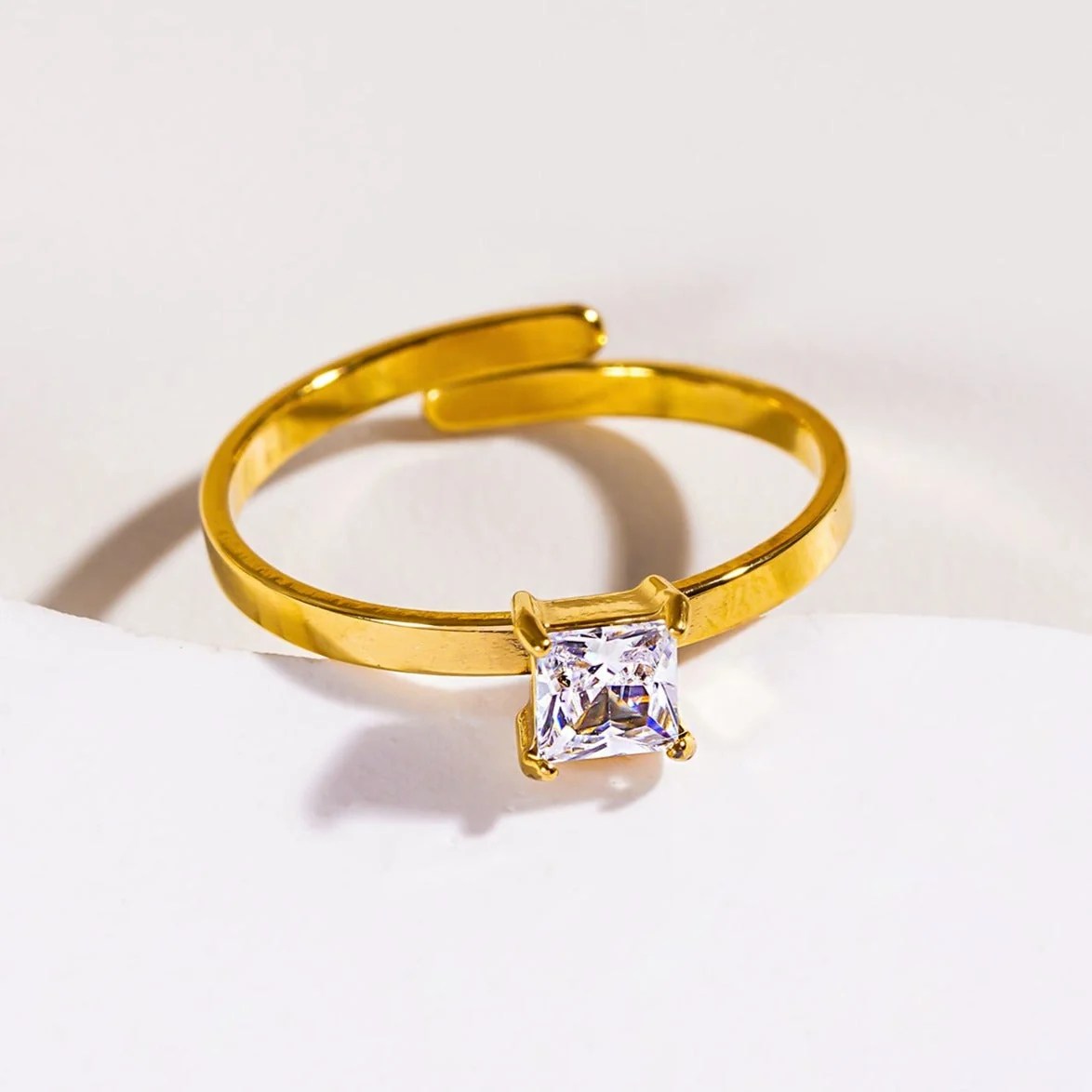 ADHIKA: Classic Gold Ring with a Square Zirconia Centerpiece - Image 8