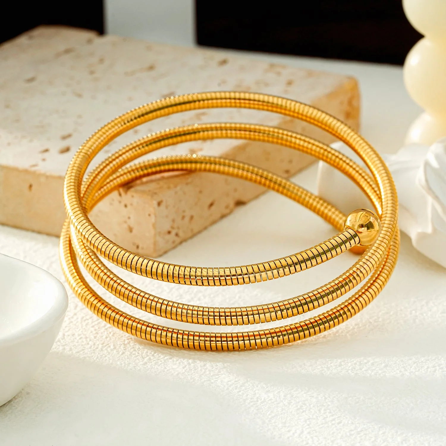 BASHEE: Triple Stacked Gold Bracelet with Surface Lines & Ball Bead Accents. - Image 7