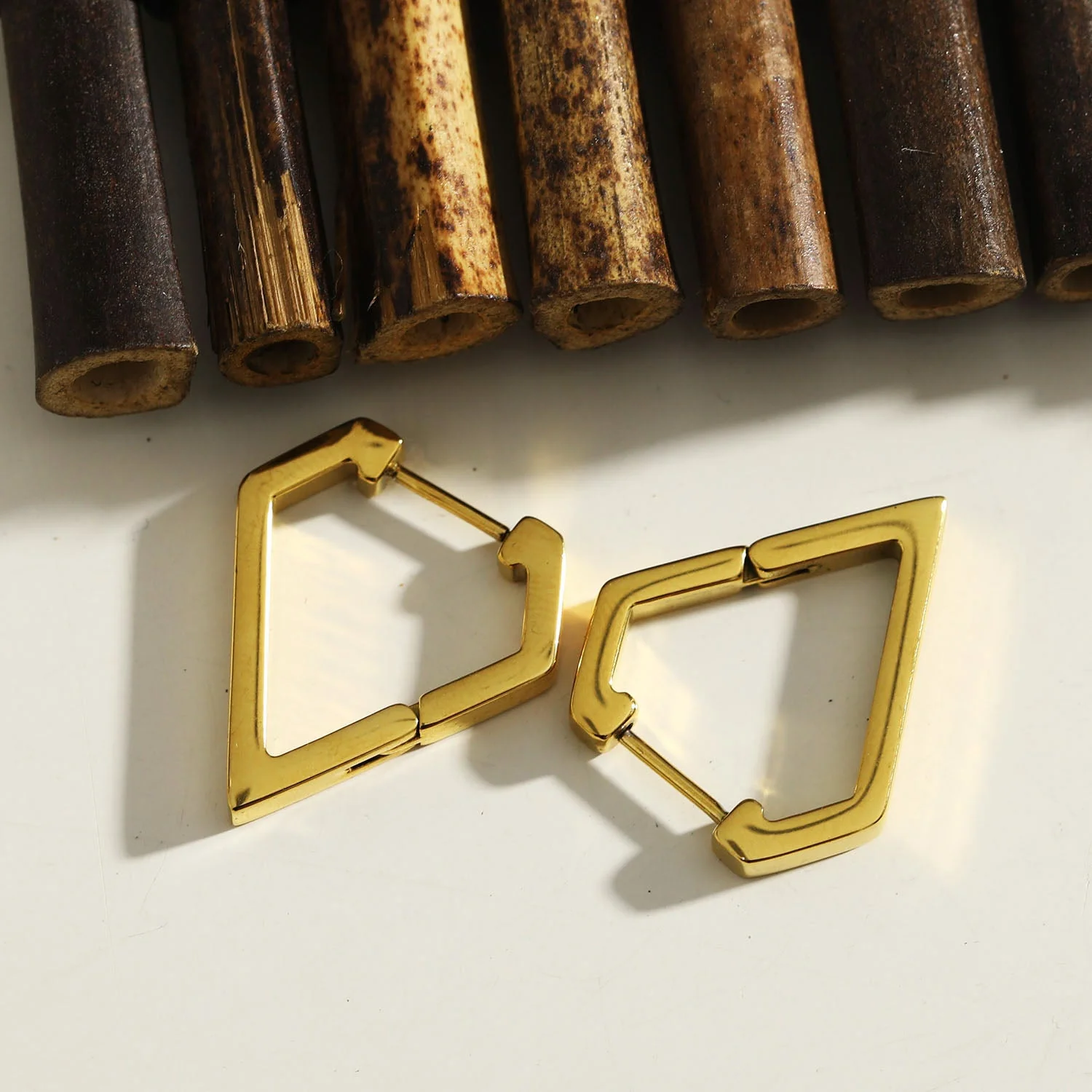 CAGLIARI: Triangle Shaped Contemporary Hoop Earrings in Gold - Image 5