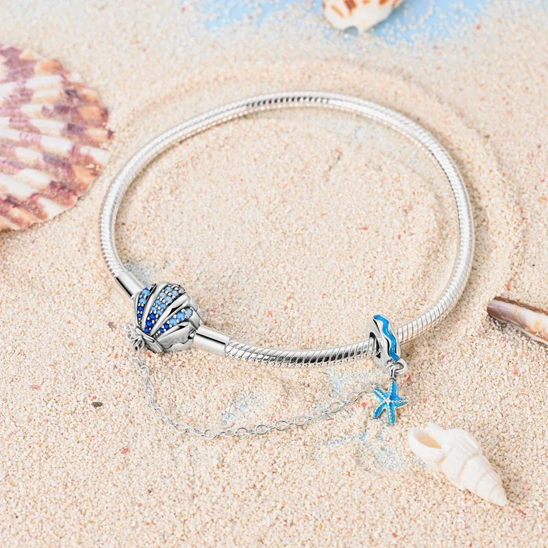 Sterling Silver Seashell Charm Bracelet with Blue CZ Gradient - Image 3