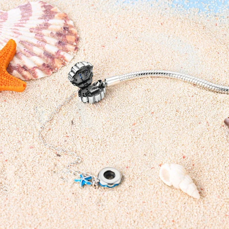 Sterling Silver Seashell Charm Bracelet with Blue CZ Gradient - Image 4