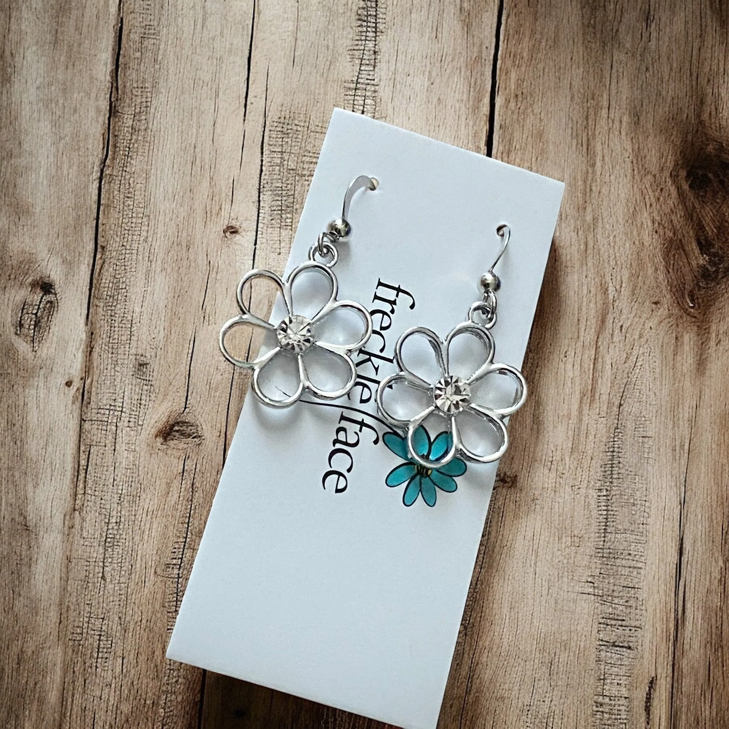 Cutie Patootie Flower Earrings – Silver Floral Dangles with Rhinestone Center