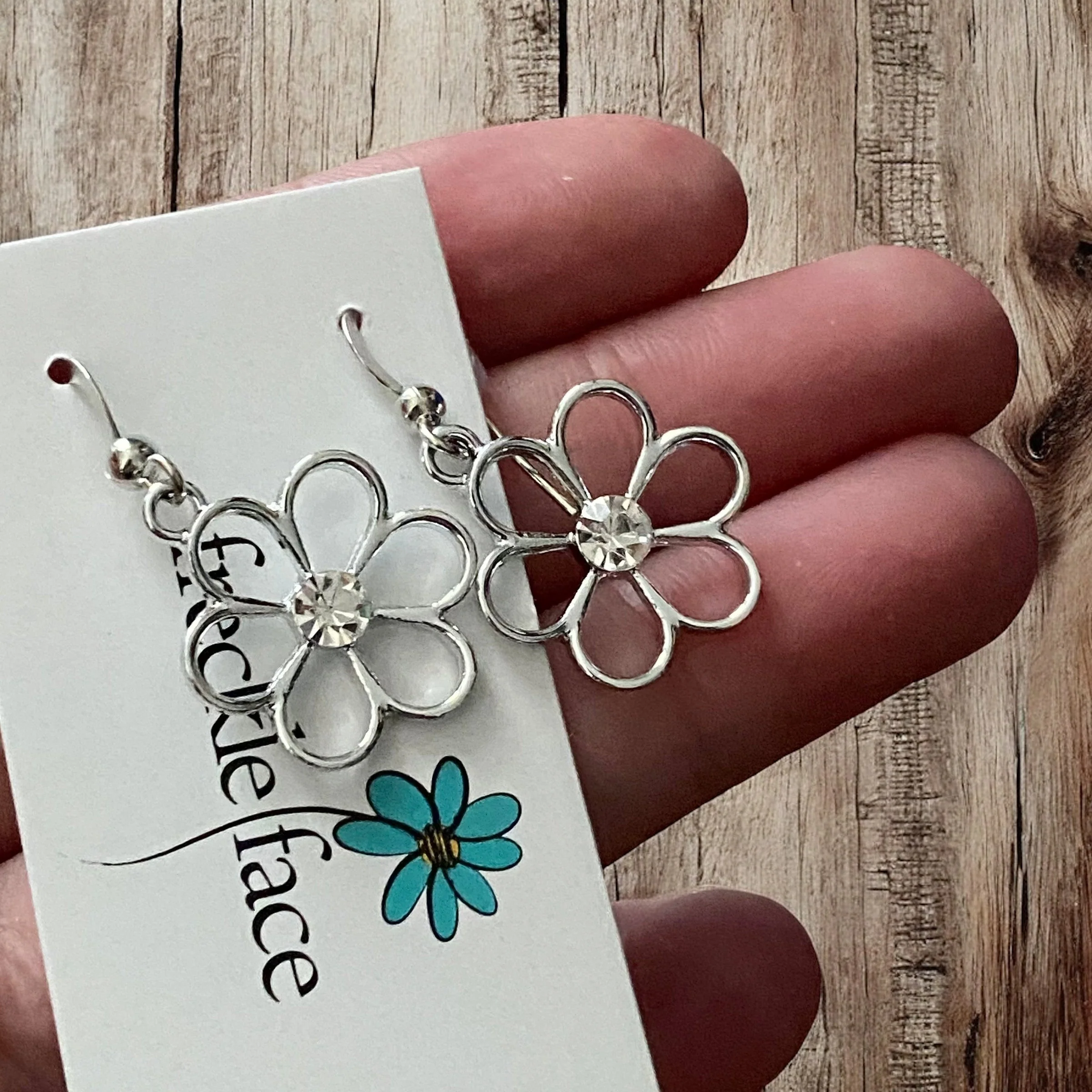 Cutie Patootie Flower Earrings – Silver Floral Dangles with Rhinestone Center - Image 2