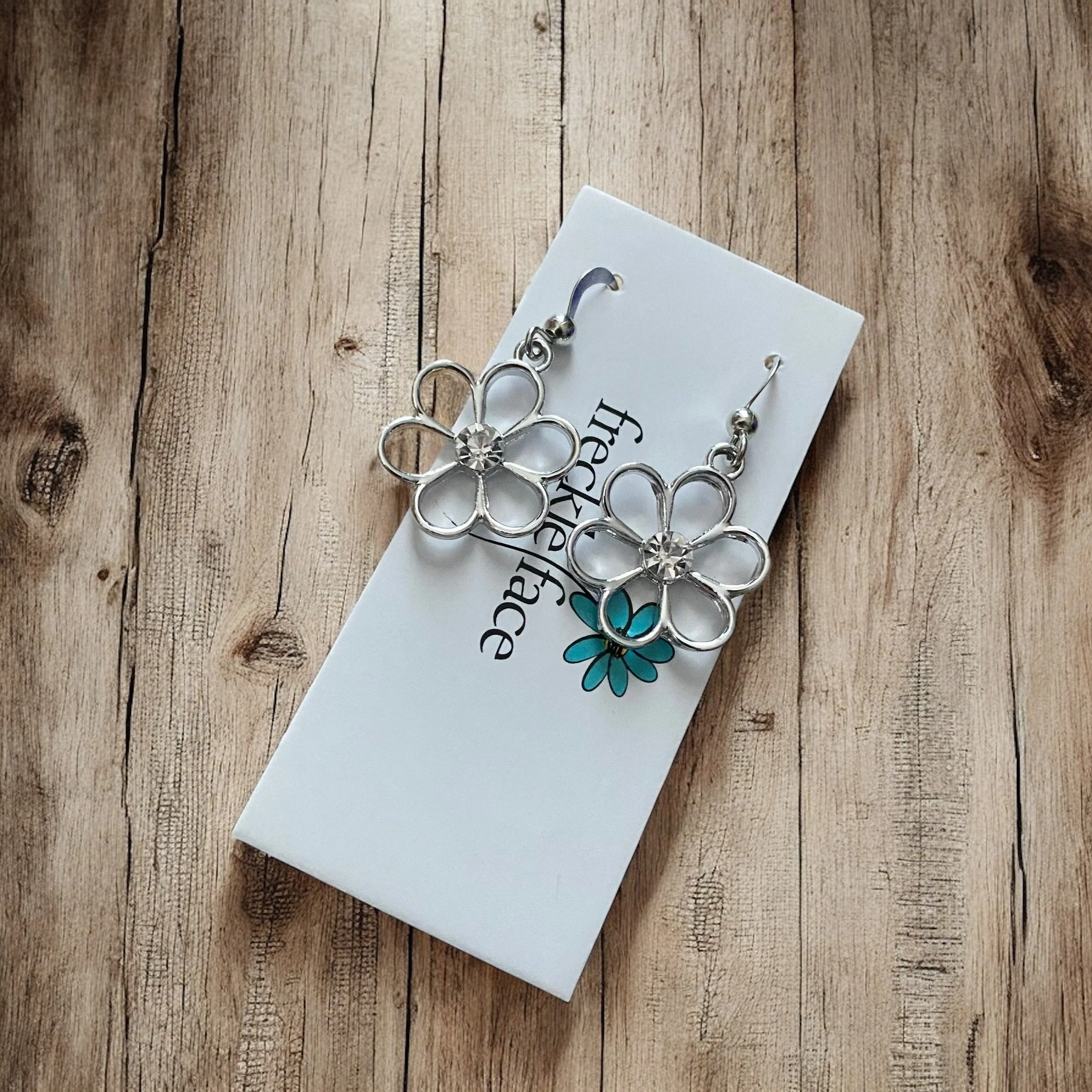 Cutie Patootie Flower Earrings – Silver Floral Dangles with Rhinestone Center - Image 3