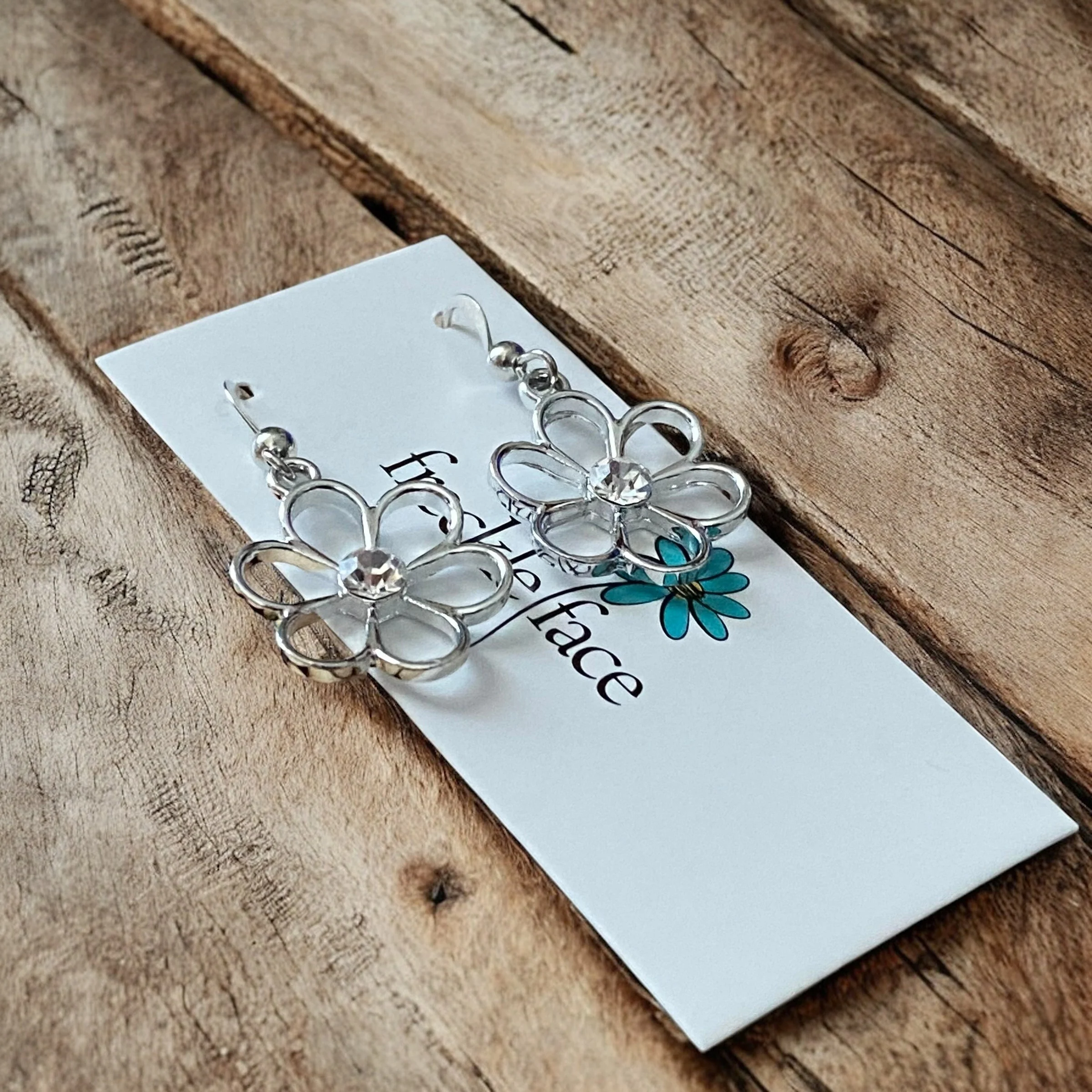 Cutie Patootie Flower Earrings – Silver Floral Dangles with Rhinestone Center - Image 5