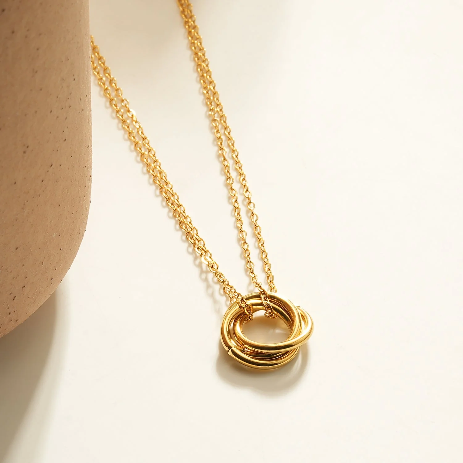 ELVIRA Gold: Double Chain Dainty Necklace with Intertwined 3-Ring Pendant – Symbol of Love, Unity & Eternity - Image 5