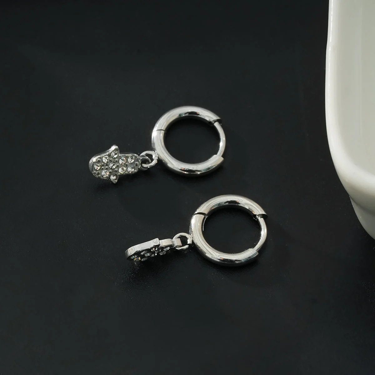 FATIMA White Gold (Silver Toned): Pavé Zirconia (CZ) Mini Hoop Earrings with Hamsa Hand Charm – A Perfect Blend of Style and Protection - Image 7