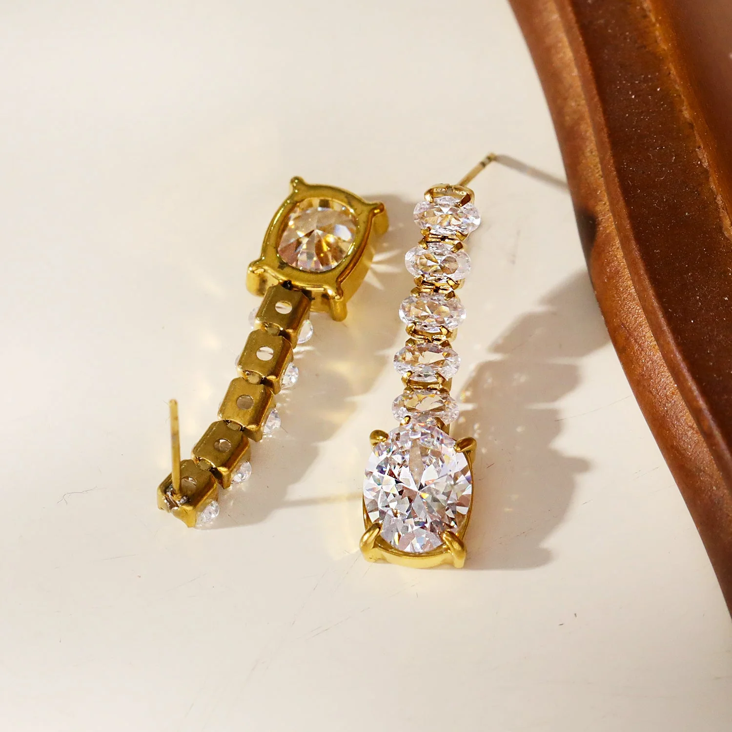 MALIA: Radiant Cascading Zirconia Drop Earrings - Image 7