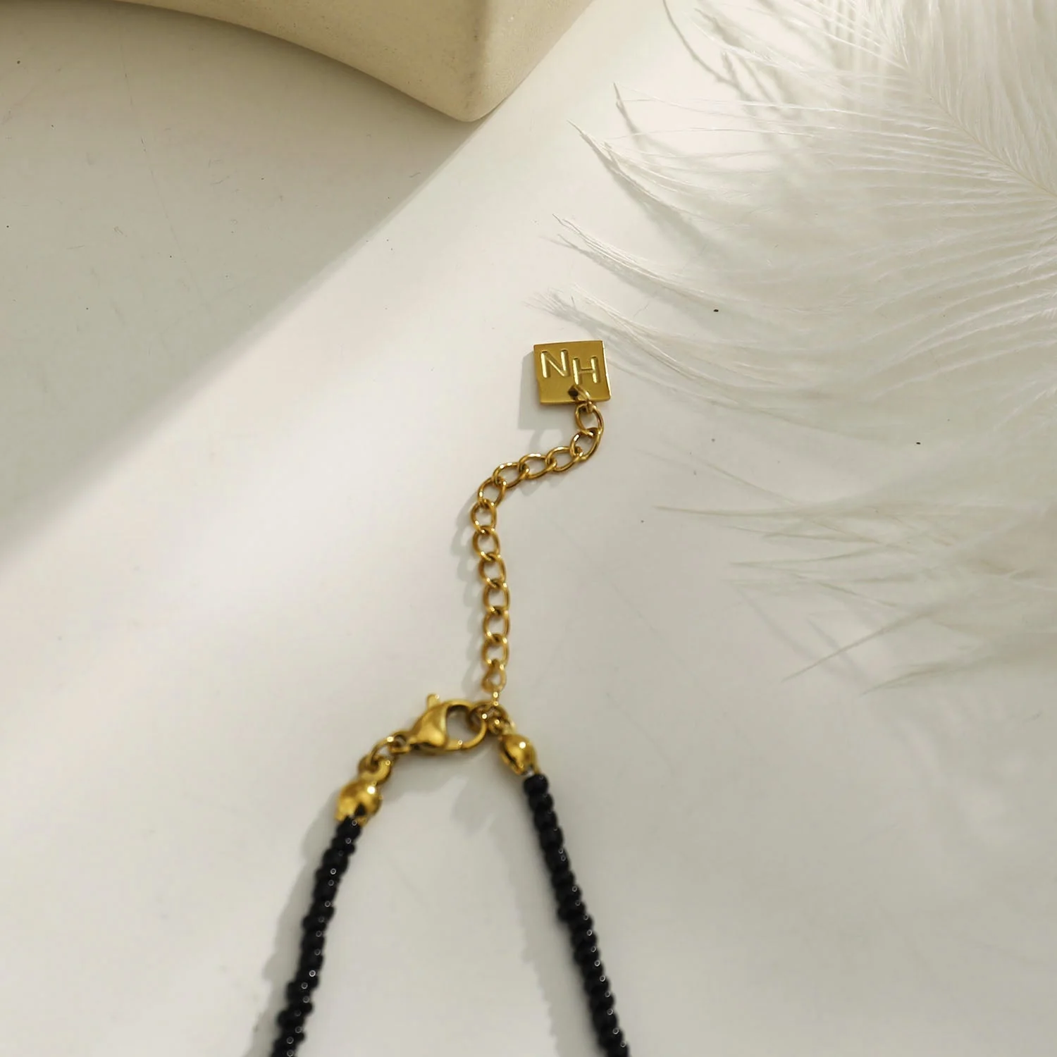 RITA Black & Gold Beaded Chain Necklace with Etched Gold Tooth Pendant - Image 7