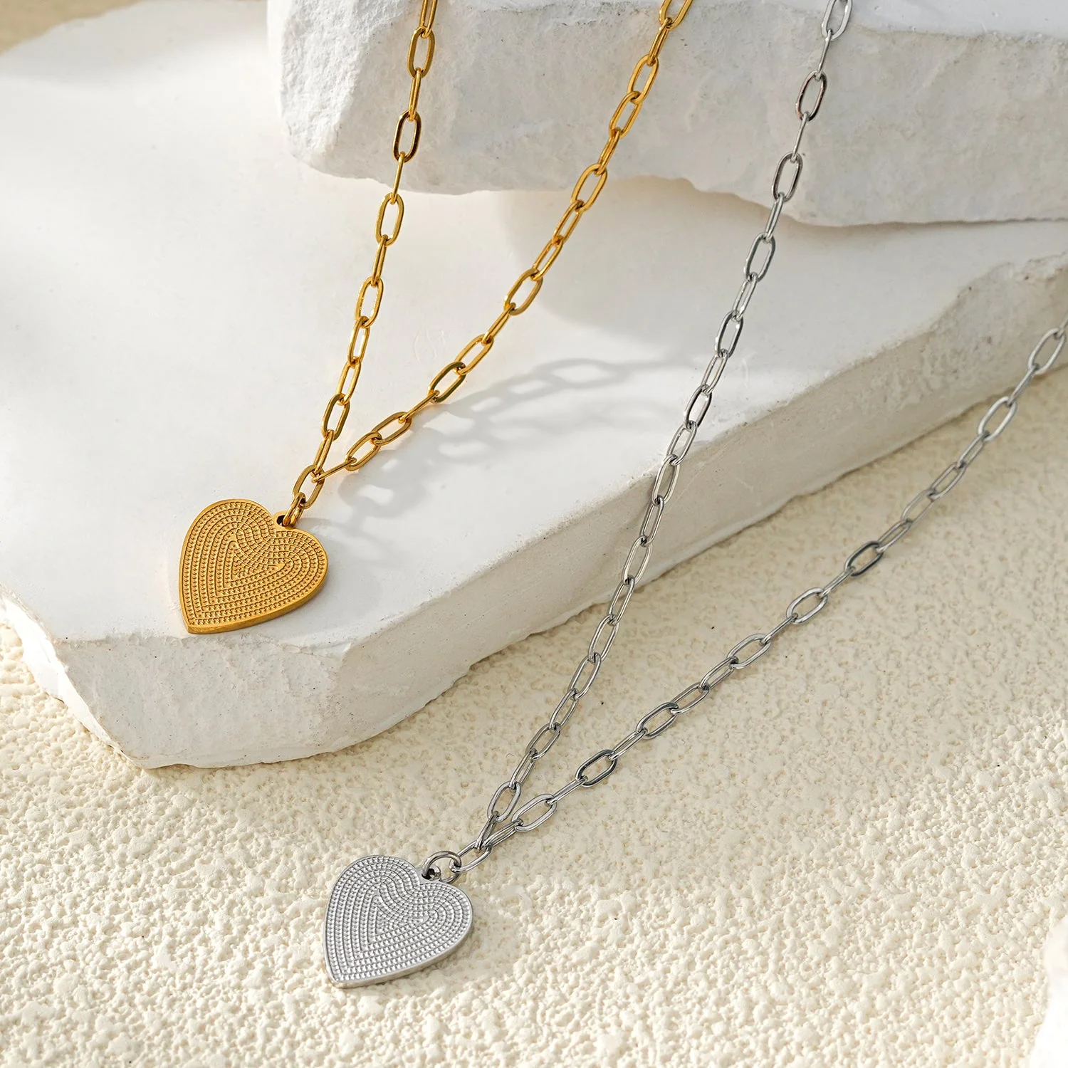 Style ALARA: Mini Paper Clip Chain Anchoring a Patterned Heart Charm in Silver - Image 6