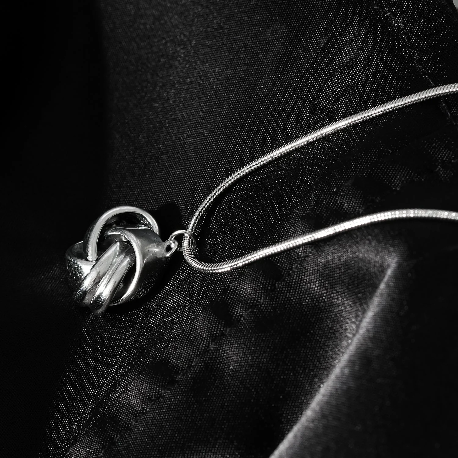 Style JASPUR: Snakeskin Chain Necklace with Love-Knot Pendant in White Gold (Silver Toned) - Image 6