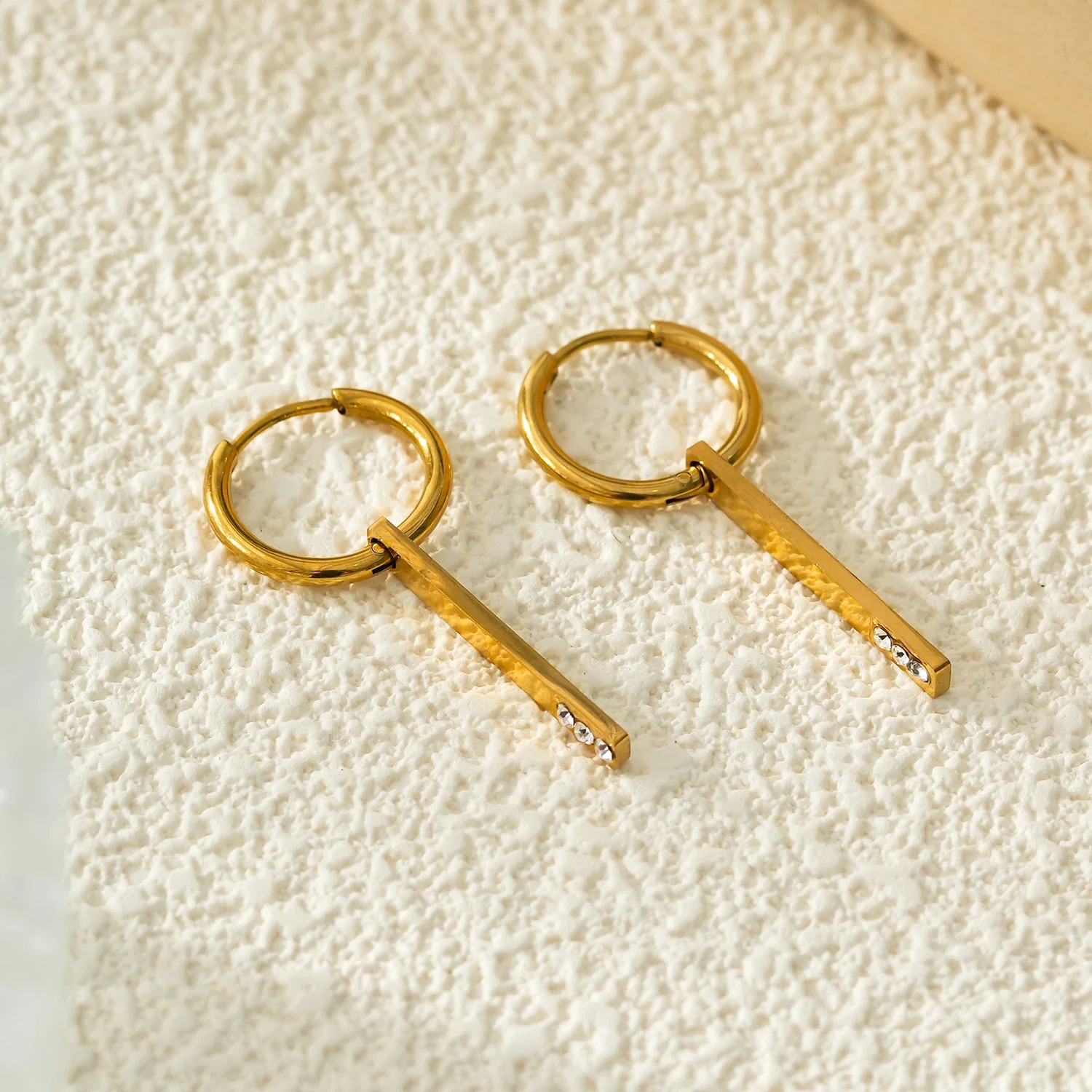 Style MAYLA: Gold Hoops with a Minimalist Charm featuring a Trio of Zirconia Gemstones - Image 3