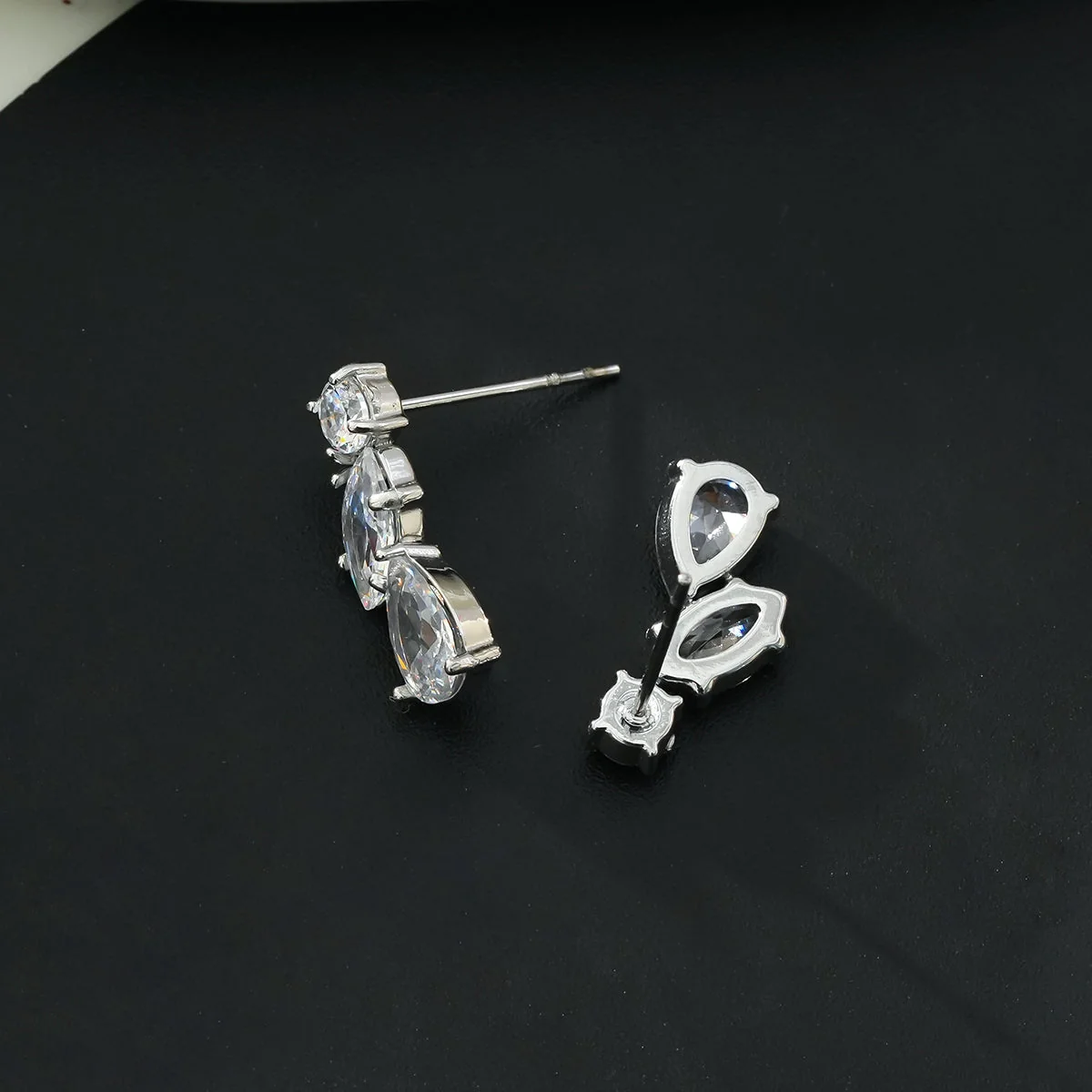 THEOLA: Radiance Triple Moissanite Stack Stud Earrings in Silver Toned White Gold - Image 5