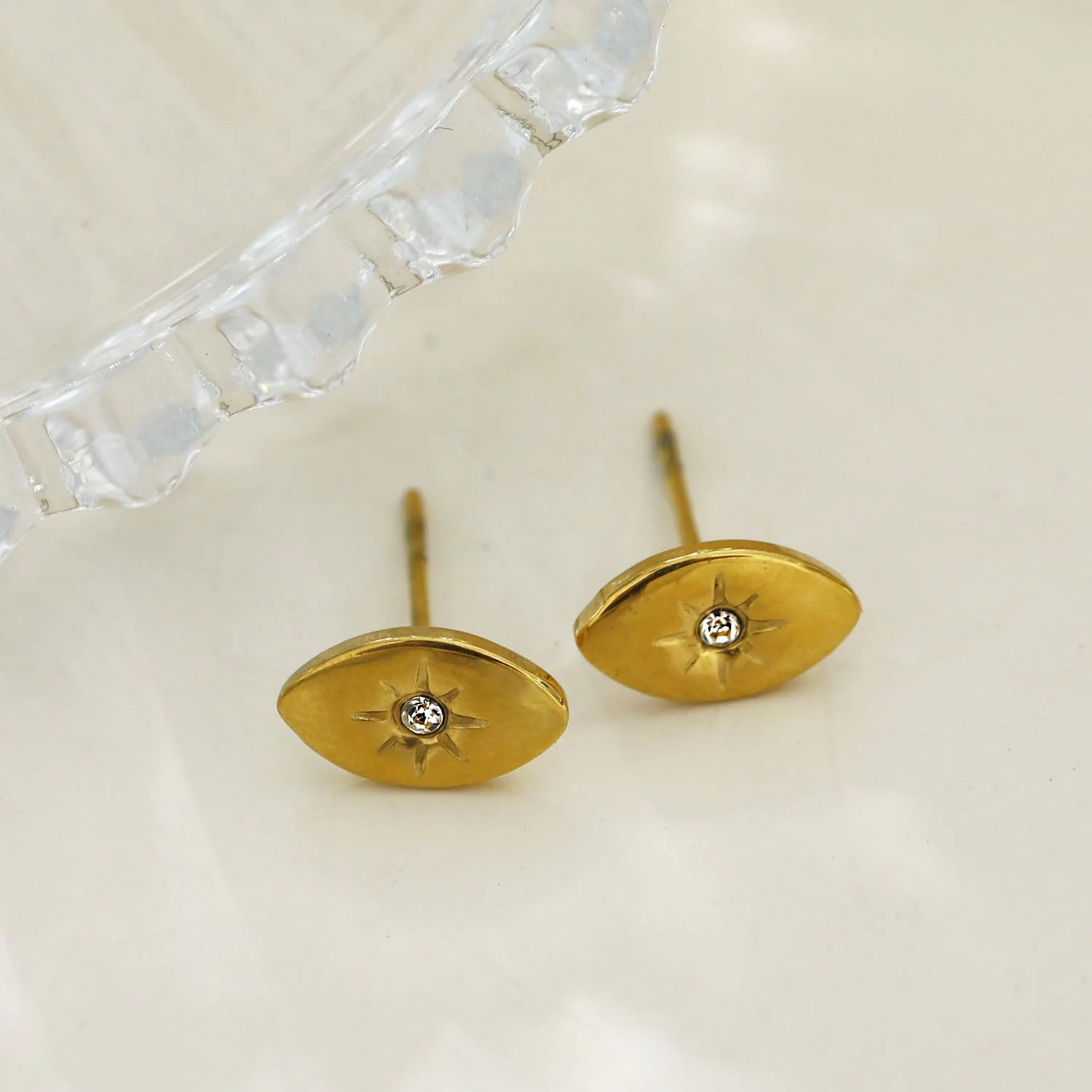 TINDRA: Oval Shaped Gold Stud Earrings Featuring a Solitaire Zirconia - Image 3